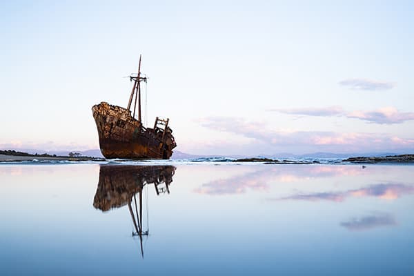 The Dimitrios shipwreck near Gythio, Greece - @roasn_com 09/2022 The Dimitrios shipwreck, a rusted and abandoned cargo vessel, rests on the sandy shore of Valtaki Beach near Gythio, Greece. Captured by @roasn_com, this iconic maritime relic reflects beautifully in the shallow water at sunset, creating a dramatic and picturesque seascape. A must-visit destination for photographers and travelers exploring Greece's hidden gems.